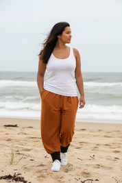 Orange byxor med mudd