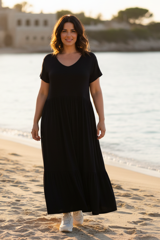 Svart klänning strand